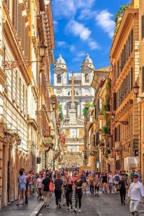 Rome/Italy - 26 August, 2018: Italian street Via dei Condotti, leading to Piazza di Spagna and the Spanish Steps on a sunny day